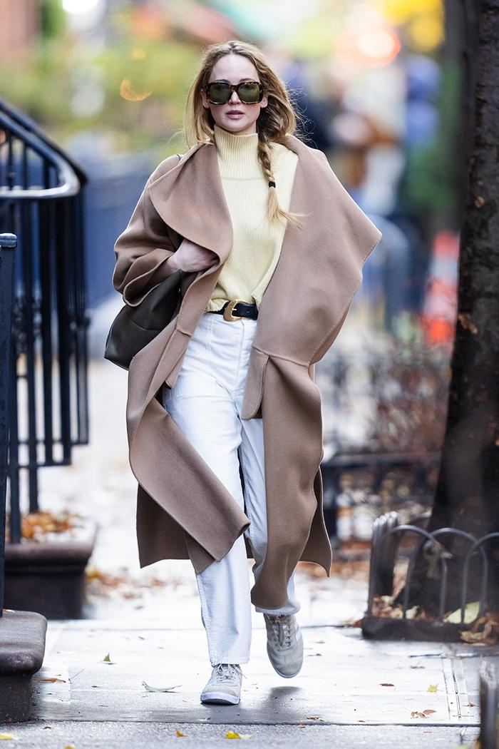 Jennifer Lawrence wearing a camel coat